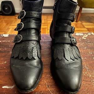 Modern Vice Jett boots.